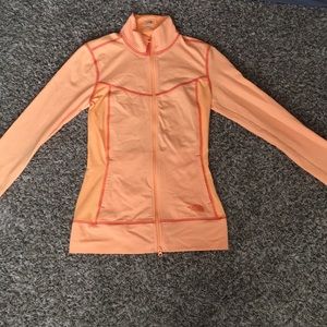 Women’s orange North Face jacket